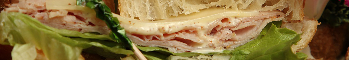 Eating Sandwich at Submarina California Subs Rancho Bernardo restaurant in San Diego, CA.